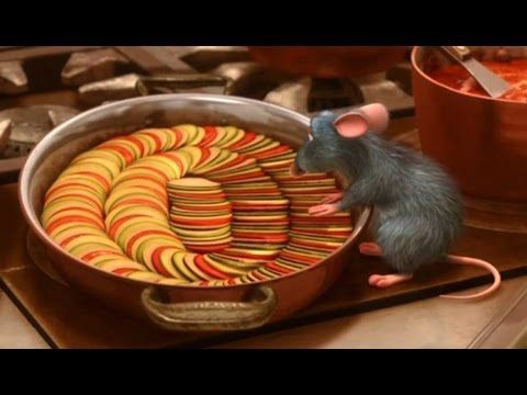 chef Remy prepping the ratatouille for roasting